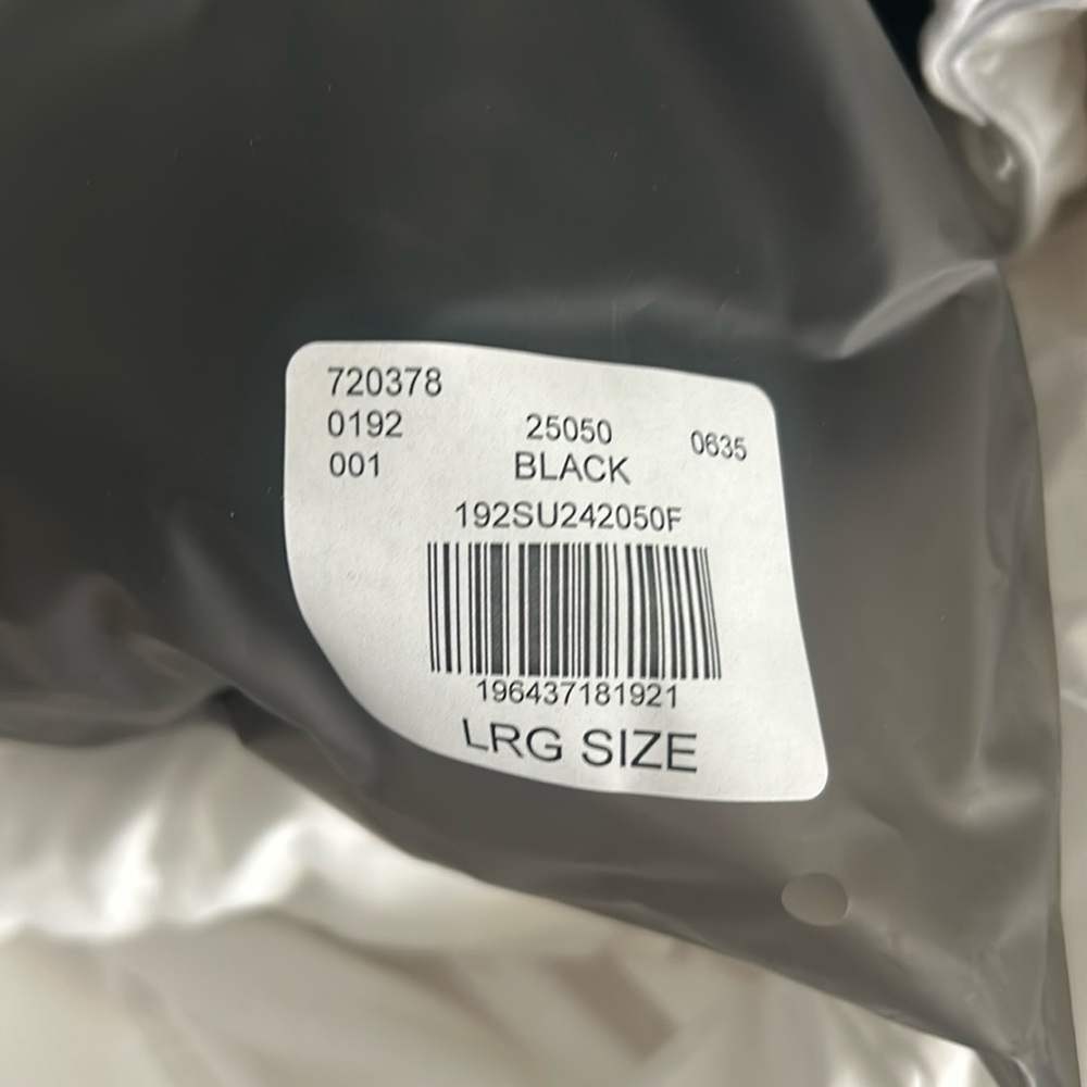 Large black Fear of God Essentials hoodie
